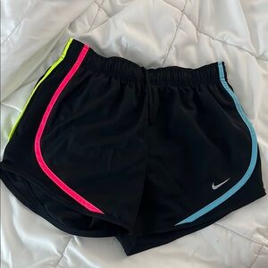 Nike Black and Pink Athletic Shorts with Curved Hem